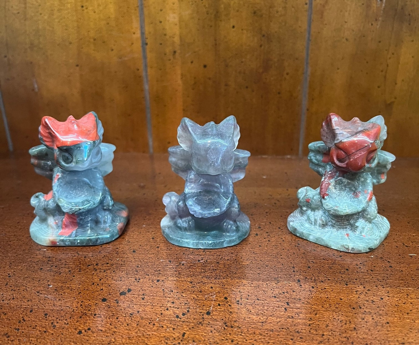 Baby dragon reading a book crystal/stone carving-assorted