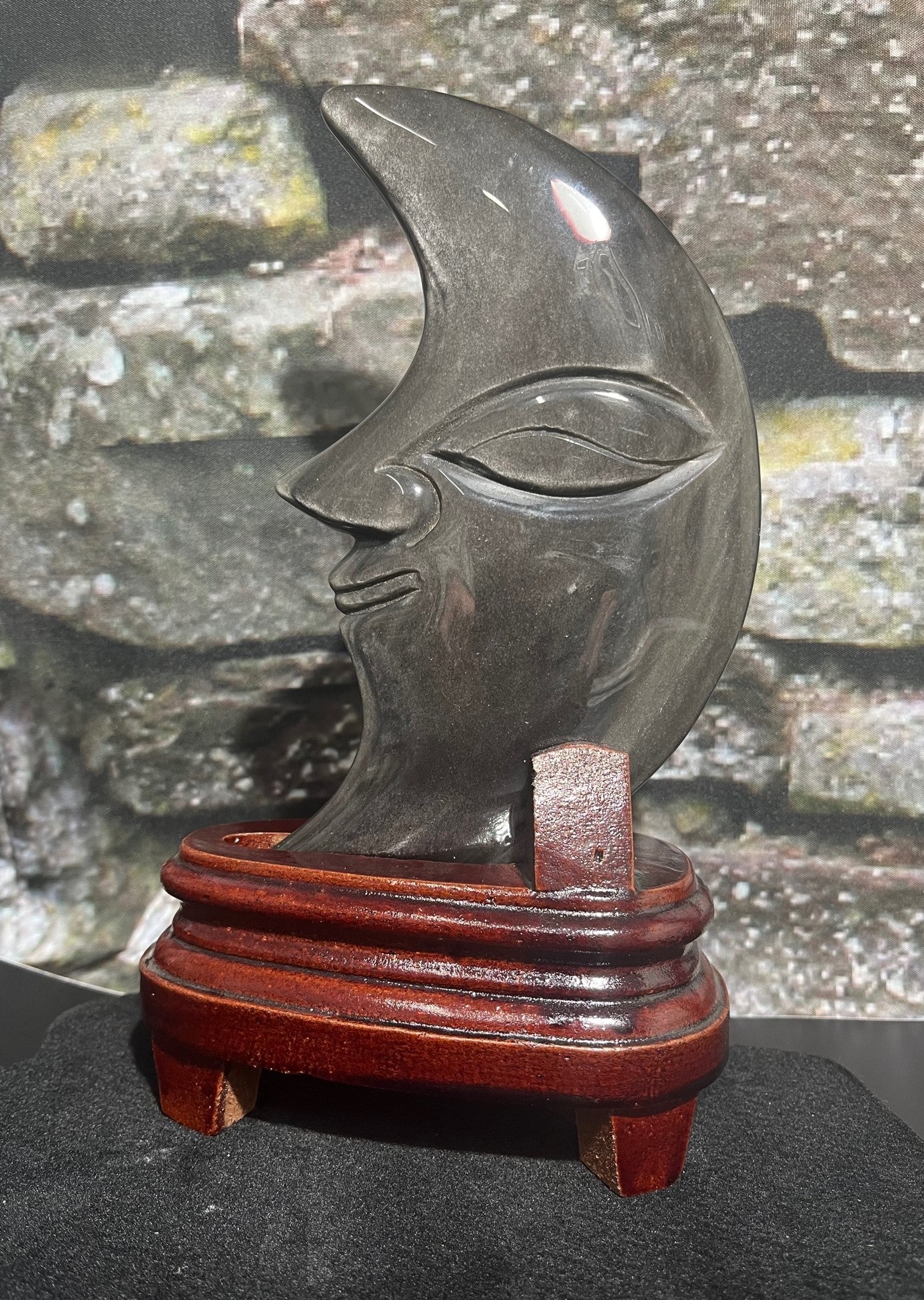Silver obsidian moon with face crystal/stone carving