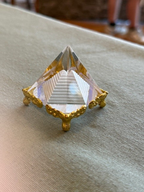 Clear Quartz Pyramid with gold Stand
